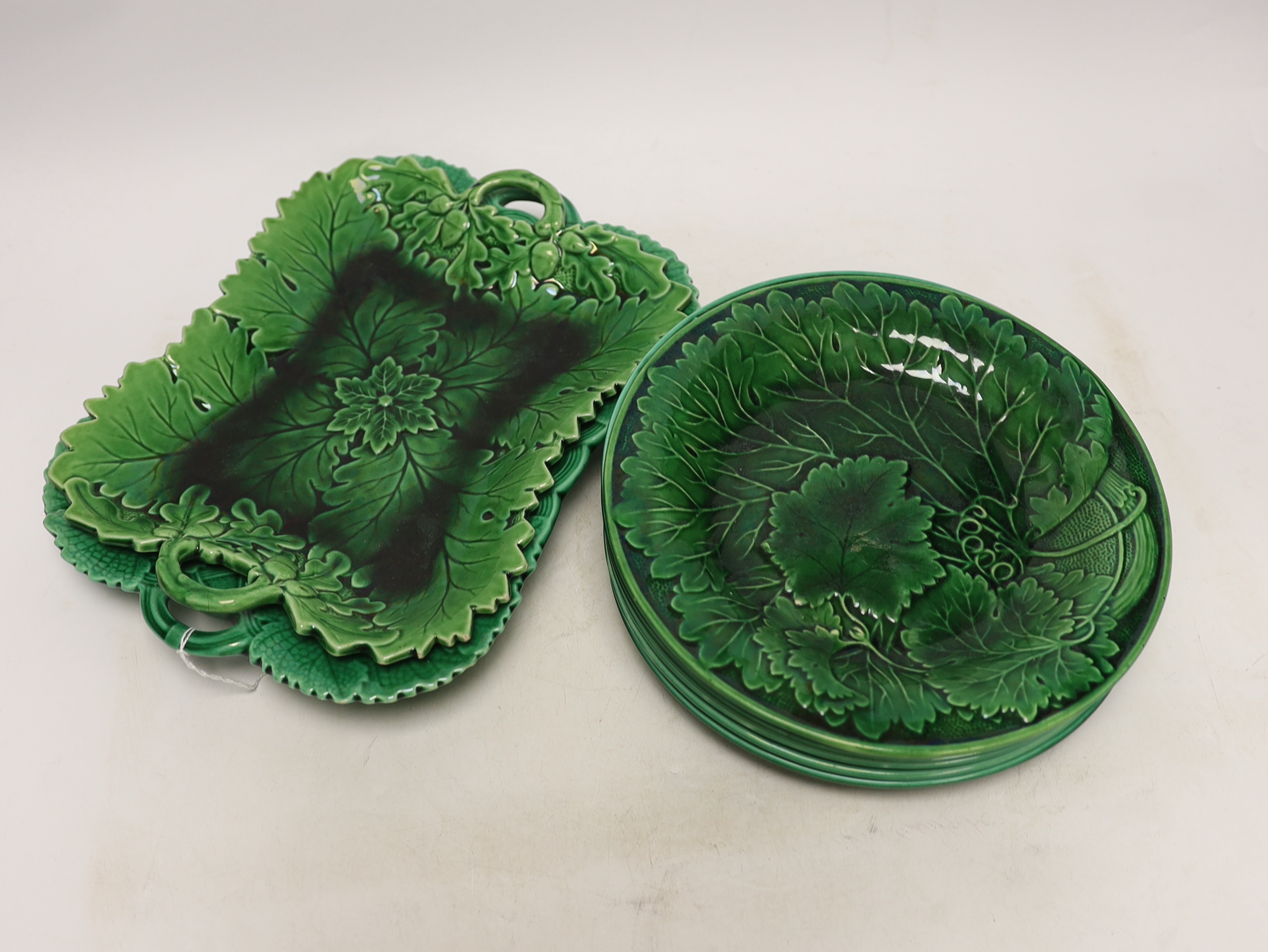 Nine pieces of Victorian cabbage ware green glazed majolica dessert plates and dishes, mostly Wedgwood